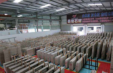 嘉巖石材入駐福建水頭中閩石材商城，建立起福建省第一個(gè)超大型精品木紋專賣場(chǎng)。